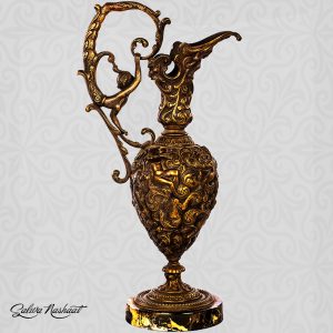 Bronze carafe with carvings