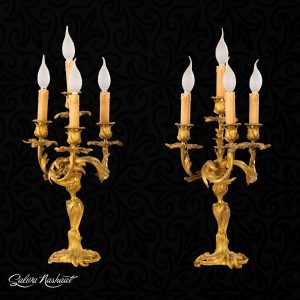 Pair of French bronze 4-candle-candelabra